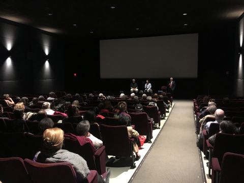 audience viewing panel discussion